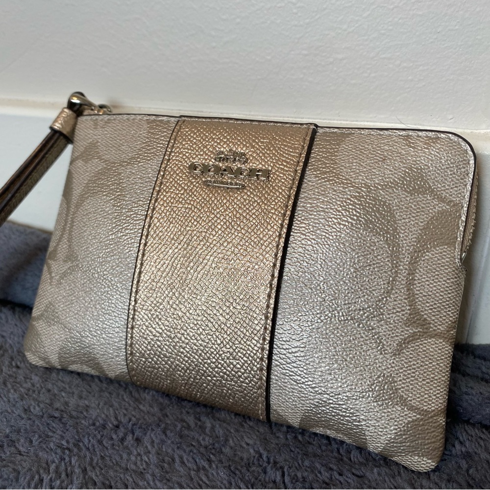COACH Zip Wristlet Pebbled Leather Champagne Metallic Signature Logo